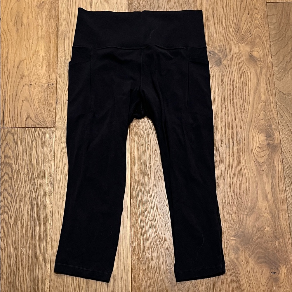 Athleta Salutation Leggings, size medium